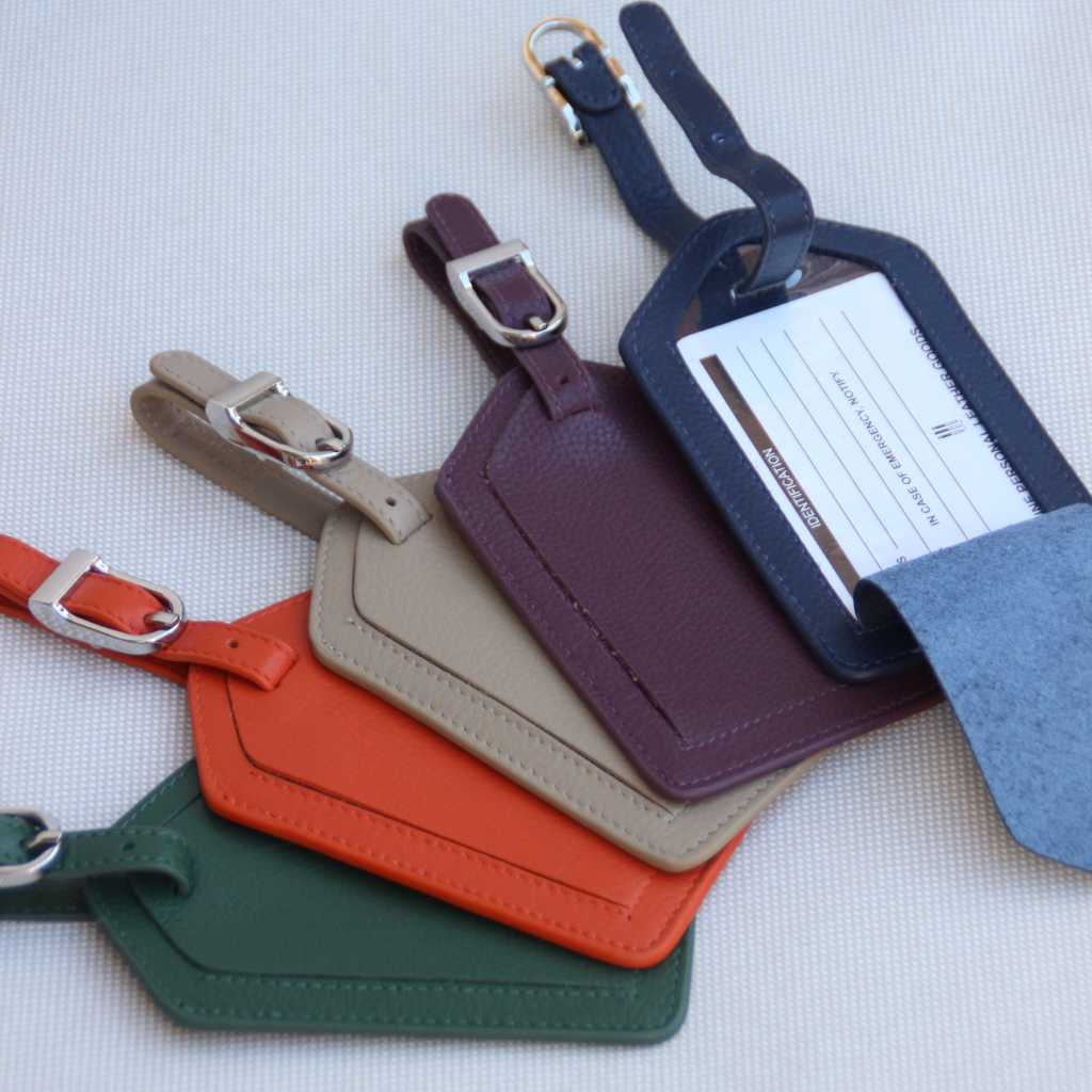 Taupe Leather Suitcase Identifier